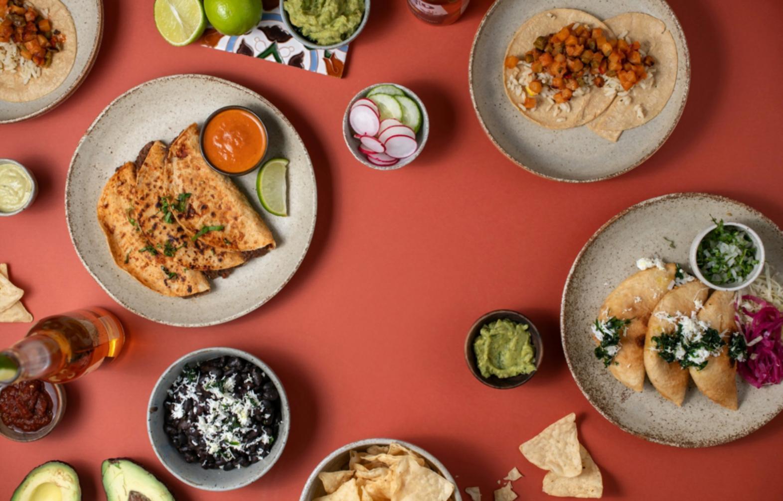 Instructor demonstrating healthy cooking technique in kitchen workspace
